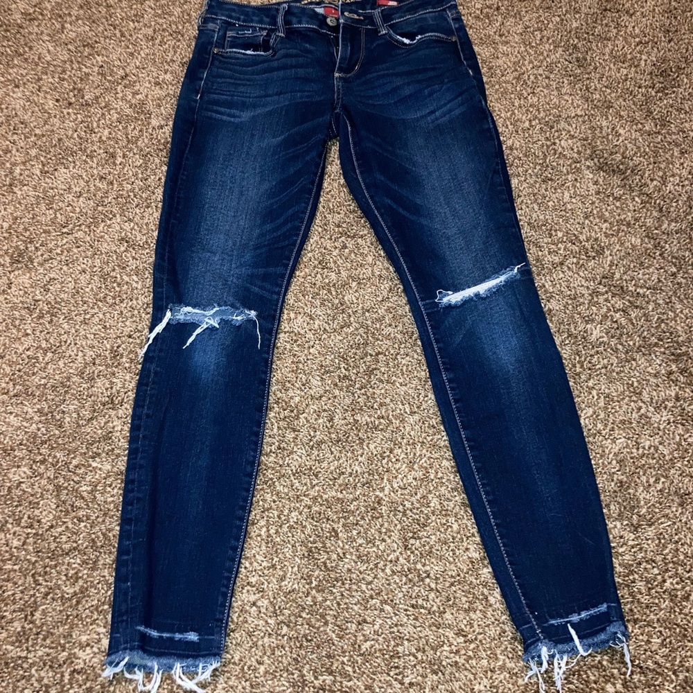 Ripped blue jeans